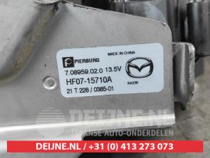 Extra vattenpump från en Mazda 3 Sport (BP) 2.0 SkyActiv-X M Hybrid 16V 2022