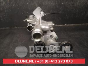 Kompressor van een Nissan Micra (K13) 1.2 12V DIG-S 2012