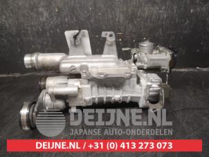 Kompressor van een Nissan Micra (K13) 1.2 12V DIG-S 2012