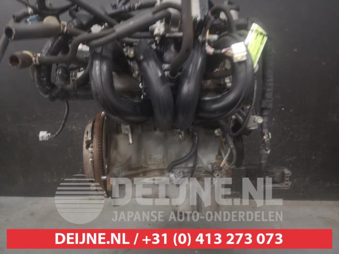 Motor van een Toyota Yaris II (P9) 1.3 16V VVT-i 2008