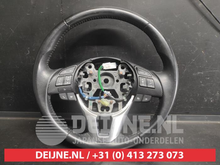 Używane Kierownica Mazda CX-3 (DJ/DK) 2.0 SkyActiv-G 120 Cena € 100,00 Procedura marży oferowane przez V.Deijne Jap.Auto-onderdelen BV