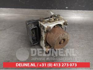 Used ABS pump Mazda 323 (BJ12) Price € 75,00 Margin scheme offered by V.Deijne Jap.Auto-onderdelen BV