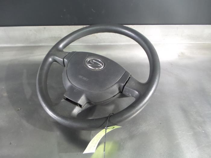 Airbag izquierda (volante) de un Daihatsu Sirion 2 (M3) 1.0 12V DVVT 2007