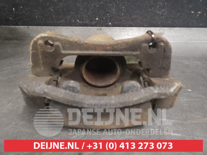 Front brake calliper, left from a Kia Cee'd Sportswagon (JDC5) 1.6 CRDi 16V VGT 2012