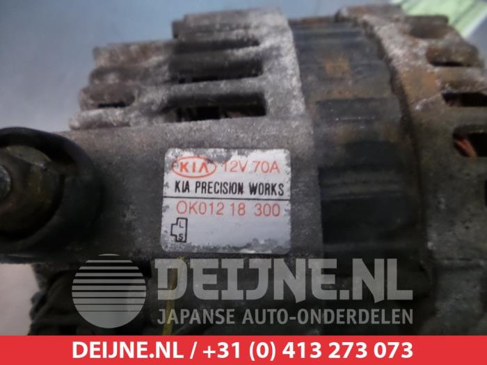 Dynamo van een Kia Sportage (K0) 2.0 16V 4x4 1995