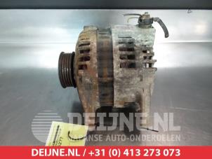 Dynamo van een Kia Sportage (K0) 2.0 16V 4x4 1995