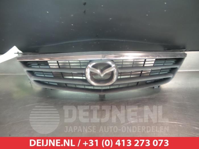 Używane Grill Mazda 626 (GW19) 1.8i 16V Cena € 25,00 Procedura marży oferowane przez V.Deijne Jap.Auto-onderdelen BV