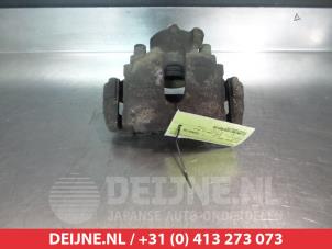 Used Front brake calliper, left Toyota Avensis (T22) 2.0 TD Price on request offered by V.Deijne Jap.Auto-onderdelen BV