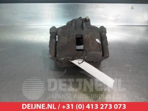Used Front brake calliper, left Nissan Micra (K11) 1.5 D Price € 30,00 Margin scheme offered by V.Deijne Jap.Auto-onderdelen BV