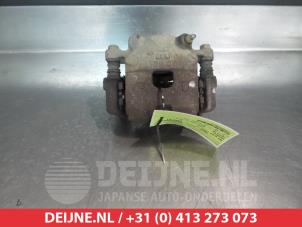 Used Front brake calliper, left Daihatsu Trevis 1.0 12V DVVT Price € 35,00 Margin scheme offered by V.Deijne Jap.Auto-onderdelen BV