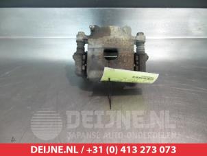 Used Front brake calliper, right Daihatsu Trevis 1.0 12V DVVT Price € 35,00 Margin scheme offered by V.Deijne Jap.Auto-onderdelen BV