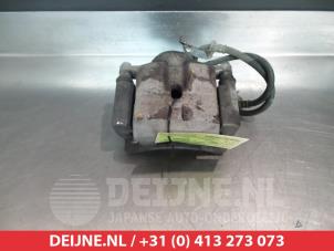 Used Front brake calliper, left Toyota Prius (ZVW3) 1.8 16V Price € 50,00 Margin scheme offered by V.Deijne Jap.Auto-onderdelen BV