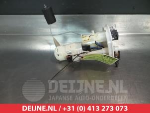 Used Electric fuel pump Daihatsu Cuore (L251/271/276) 1.0 12V DVVT Price € 35,00 Margin scheme offered by V.Deijne Jap.Auto-onderdelen BV
