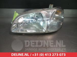 Used Headlight, left Kia Carnival 1 (FLB) 2.9 TD 16V Price € 25,00 Margin scheme offered by V.Deijne Jap.Auto-onderdelen BV