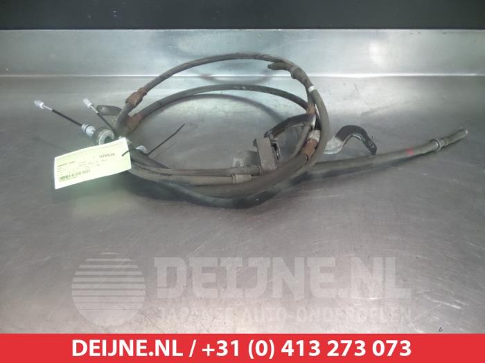 Usagé Câble frein à main Kia Rio III (UB) 1.2 CVVT 16V Prix € 20,00 Règlement à la marge proposé par V.Deijne Jap.Auto-onderdelen BV