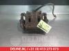 Front brake calliper, right from a Nissan Pathfinder (R51), 2005 / 2014 2.5 dCi 16V 4x4, SUV, Diesel, 2.488cc, 120kW (163pk), 4x4, YD25DDTI, 2005-01 / 2014-12, R51CC1 2005