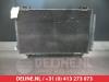 Air conditioning condenser from a Toyota Corolla Wagon (E12), 2002 / 2007 2.0 D-4D 16V 90, Combi/o, Diesel, 1.995cc, 66kW (90pk), FWD, 1CDFTV, 2002-01 / 2007-02, CDE120 2003