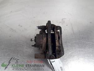 Used Front brake calliper, left Mazda Premacy 2.0 16V Price on request offered by Kleine Staarman B.V. Autodemontage