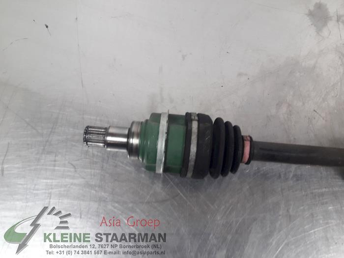 Front drive shaft, left from a Daihatsu Sirion 2 (M3) 1.3 16V DVVT 2006