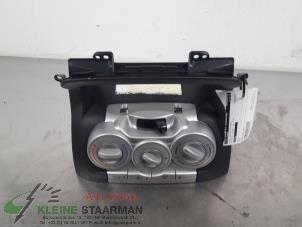 Używane Panel sterowania nagrzewnicy Daihatsu Sirion 2 (M3) 1.3 16V DVVT Cena na żądanie oferowane przez Kleine Staarman B.V. Autodemontage