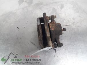 Used Front brake calliper, left Daihatsu Charade (G200/201/202/203/204) 1.3i TX/CX 16V Price on request offered by Kleine Staarman B.V. Autodemontage