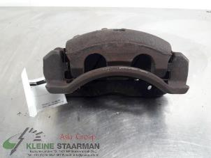 Used Front brake calliper, left Hyundai Santa Fe I 2.0 16V 4x2 Price on request offered by Kleine Staarman B.V. Autodemontage