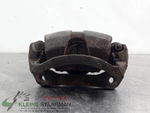 Used Front brake calliper, left Daihatsu Terios (J1) 1.3 16V 4x4 Price on request offered by Kleine Staarman B.V. Autodemontage