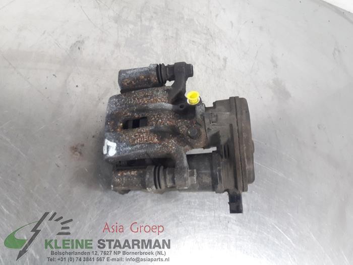 Rear brake calliper, right from a Kia Cee'd Sportswagon (JDC5) 1.6 GDI 16V 2017