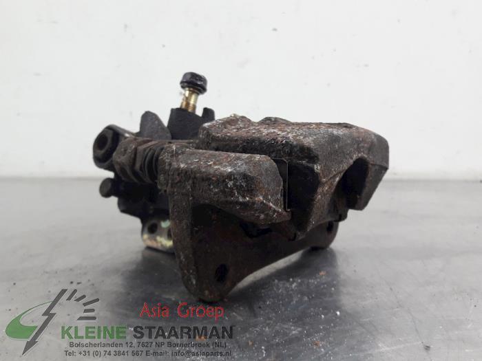Rear brake calliper, right from a Honda Jazz (GD/GE2/GE3) 1.3 i-Dsi 2004