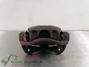 Used Front brake calliper, right Hyundai Accent 1.6i 16V Price on request offered by Kleine Staarman B.V. Autodemontage