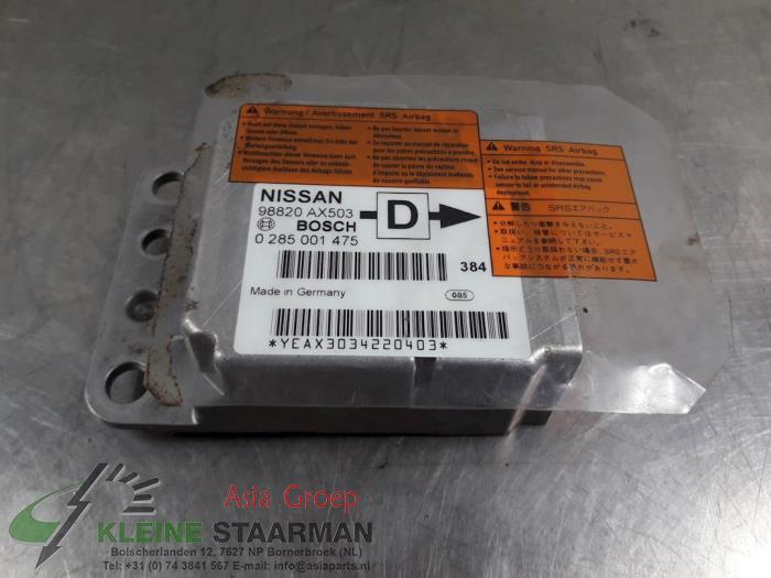 Airbag Module from a Nissan Micra (K12) 1.2 16V 2003