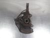 Knuckle, front left from a Toyota Auris (E15) 1.8 16V HSD Full Hybrid 2011