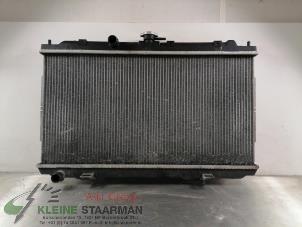 Usados Radiador Nissan Primera (P12) 1.8 16V Precio de solicitud ofrecido por Kleine Staarman B.V. Autodemontage