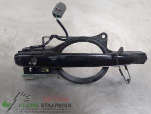 Used Door handle 4-door, front left Mitsubishi Outlander (GF/GG) 2.0 16V PHEV 4x4 Price on request offered by Kleine Staarman B.V. Autodemontage