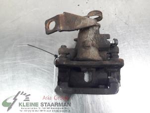 Used Rear brake calliper, left Honda Civic (FK/FN) 1.8i VTEC 16V Price on request offered by Kleine Staarman B.V. Autodemontage