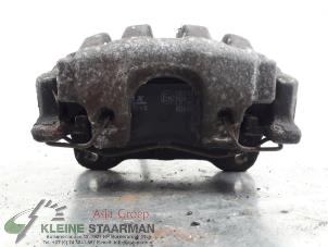 Used Rear brake calliper, right Nissan Primera Wagon (W12) 2.0 16V Price on request offered by Kleine Staarman B.V. Autodemontage