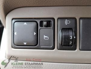 Usados Interruptor de retrovisor Nissan Note (E11) 1.6 16V Precio de solicitud ofrecido por Kleine Staarman B.V. Autodemontage