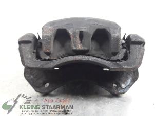 Used Front brake calliper, left Mitsubishi Outlander (GF/GG) 2.0 16V 4x2 Price on request offered by Kleine Staarman B.V. Autodemontage