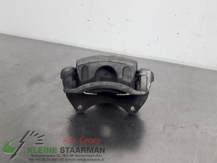 Front brake calliper, left from a Kia Optima Sportswagon (JFF) 1.7 CRDi 16V 2017