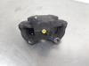 Front brake calliper, left from a Kia Optima Sportswagon (JFF) 1.7 CRDi 16V 2017