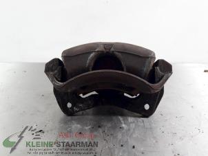 Used Front brake calliper, left Mitsubishi Colt CZC 1.5 16V Price on request offered by Kleine Staarman B.V. Autodemontage