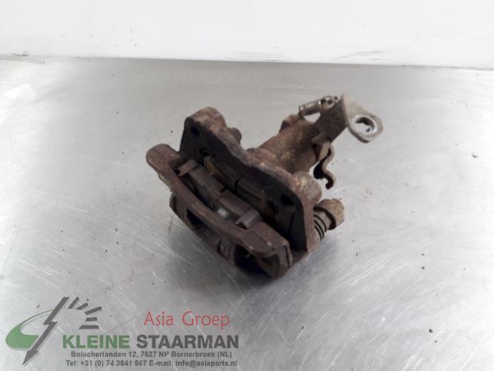 Rear brake calliper, left from a Kia Picanto (TA) 1.0 12V 2014