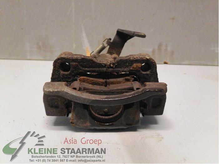 Rear brake calliper, left from a Kia Picanto (TA) 1.0 12V 2016
