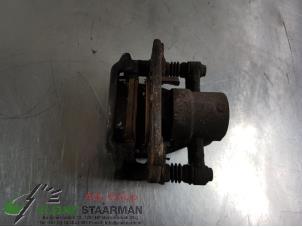 Used Rear brake calliper, left Toyota Avensis (T25/B1B) 2.0 16V VVT-i D4 Price on request offered by Kleine Staarman B.V. Autodemontage