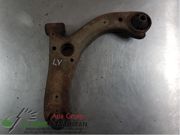 Front lower wishbone, left from a Daihatsu Cuore (L251/271/276) 1.0 12V DVVT 2008