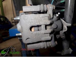 Used Rear brake calliper, left Honda Civic (FK/FN) 1.4 i-Dsi Price on request offered by Kleine Staarman B.V. Autodemontage