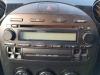 Radio CD player from a Mazda MX-5 (NC18/1A), 2006 / 2014 1.8i 16V, Convertible, Petrol, 1.798cc, 93kW (126pk), RWD, L8DE, 2005-03 / 2014-12, NC18; NC1A 2006