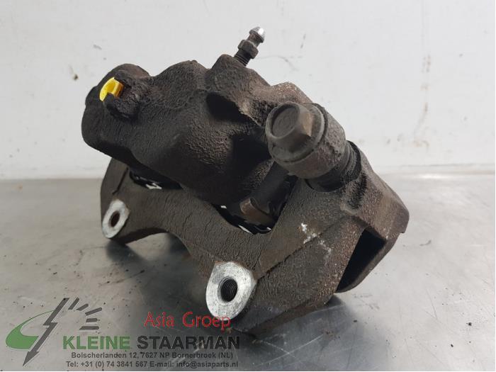 Front brake calliper, right from a Mitsubishi Outlander (GF/GG) 2.0 16V PHEV 4x4 2014