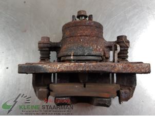 Used Front brake calliper, left Suzuki Baleno (GC/GD) 1.8 16V Price on request offered by Kleine Staarman B.V. Autodemontage