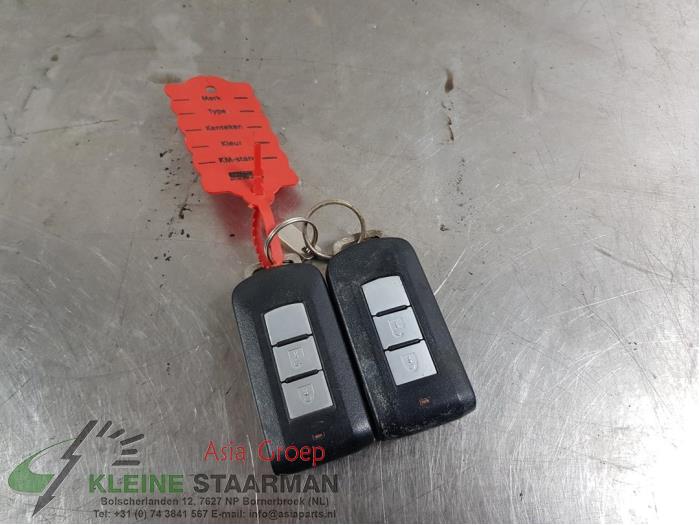 Ignition lock + computer from a Mitsubishi Eclipse Cross (GK/GL) 1.5 Turbo 16V 2WD 2018
